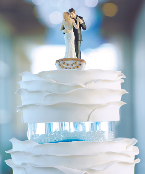 Row Away Couple Cake Toppers